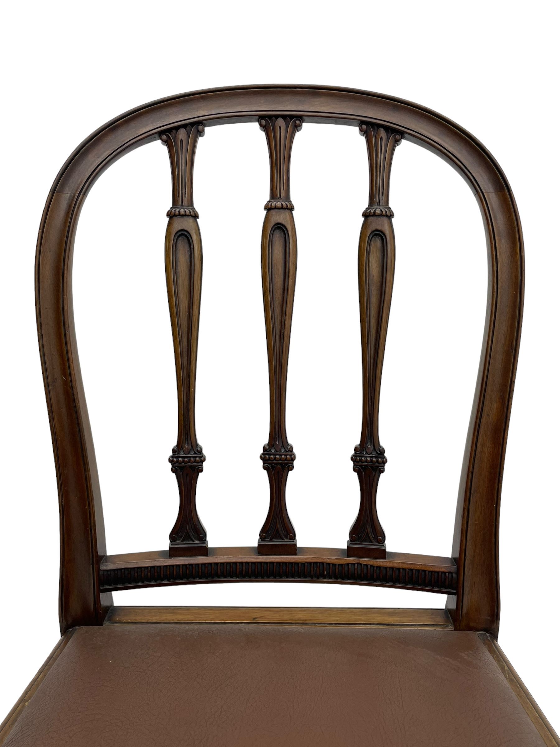 Set of six early 20th century Hepplewhite design mahogany dining chairs, moulded arched frame back, three shaped vertical rails carved with stylised foliate decoration, drop-in seats upholstered in brown fabric within moulded seat rails, on acanthus leaf carved cabriole supports with paw carved terminals 