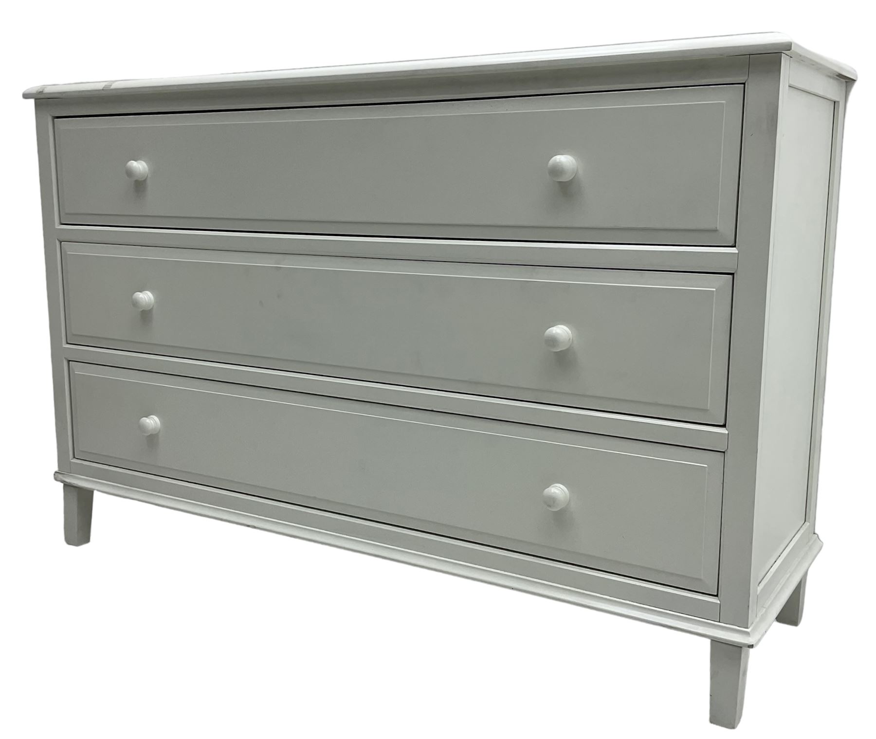 Contemporary wide white painted straight-front chest, fitted with three drawers