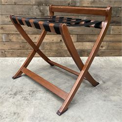 Ten walnut finish folding luggage stands