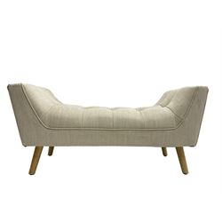 Contemporary U-shaped window or bed stool, upholstered in buttoned neutral fabric