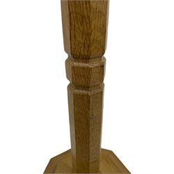 Mouseman - oak standard lamp, octagonal tapered stem on stepped and moulded octagonal base, carved with mouse signature, by the workshop of Robert Thompson, Kilburm 