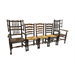 Harlequin set of nine country elm and beech chairs - pair 19th century spindle back carver armchairs with wingbacks, and a mixed set of seven ladderback side chairs, all with rush seats