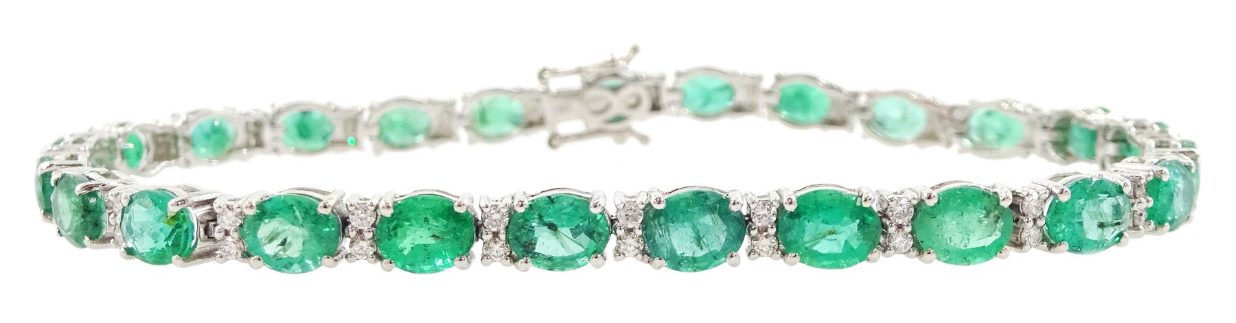 18ct white gold oval cut emerald and round brilliant cut diamond bracelet, stamped, total emerald weight approx 8.15 carat