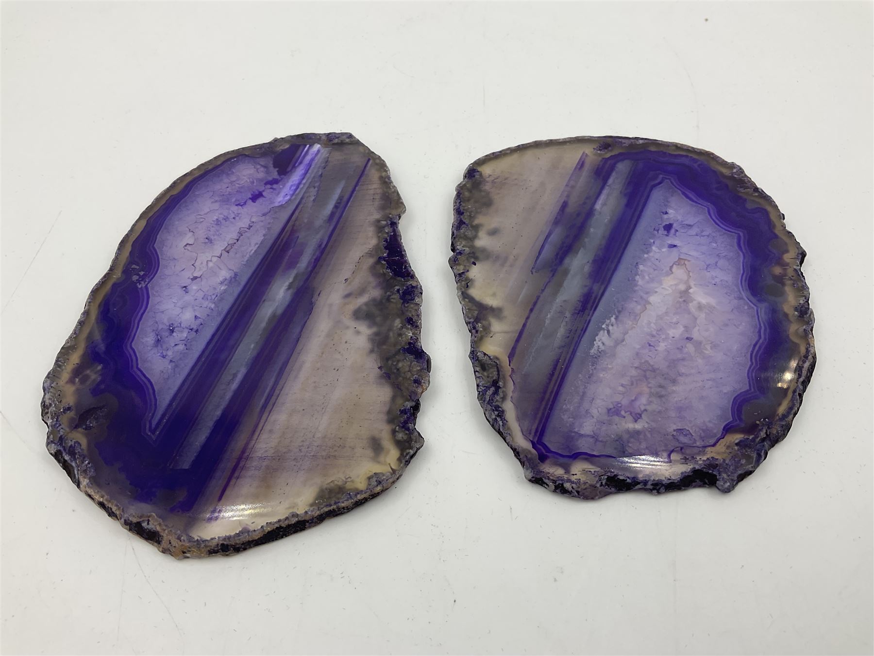 Pair of purple agate slices, polished with rough edges, H9cm, L11cm