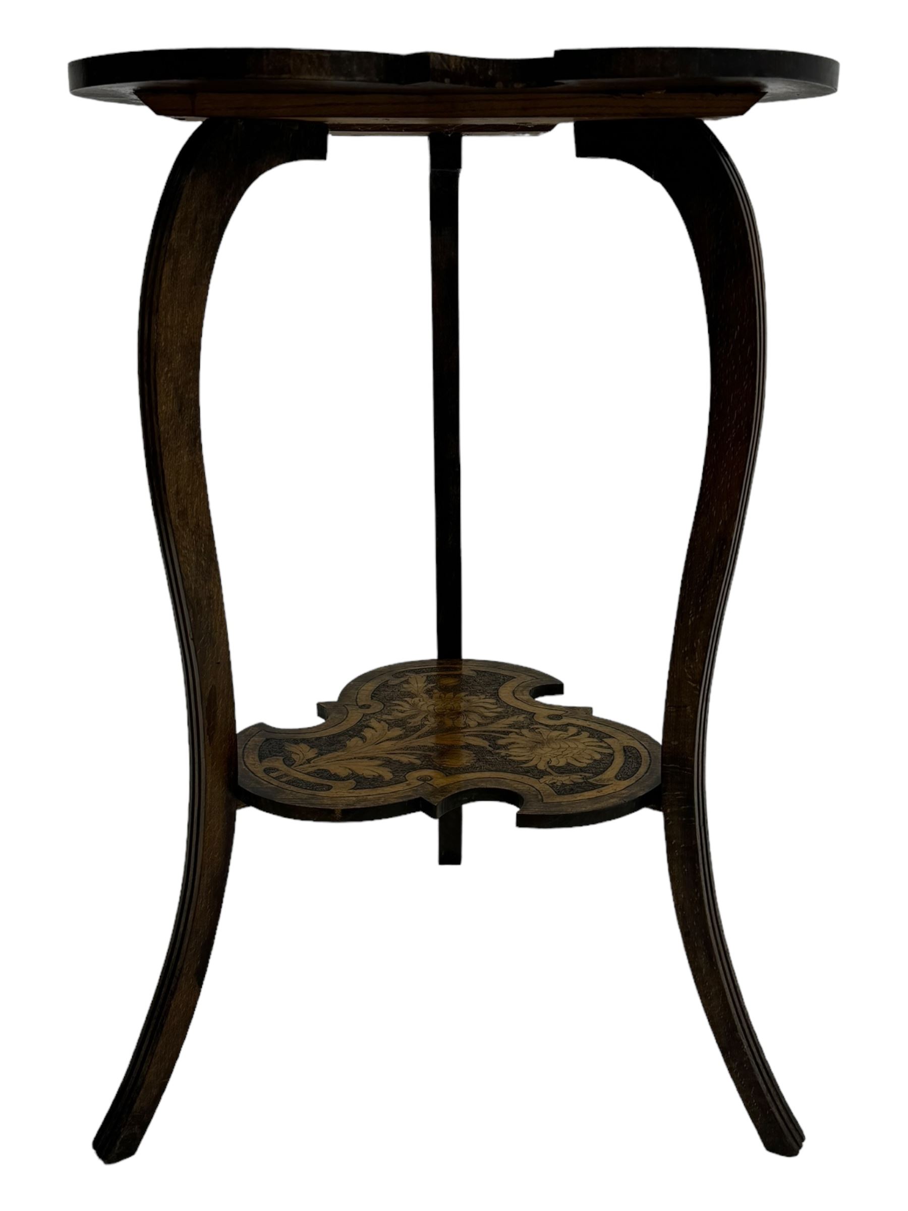 Late Victorian stained beech side table, trefoil clover-shaped top with floral pokerwork decoration, supported by curved fluted legs and united by undertier 