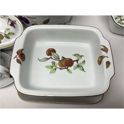 Royal Worcester Evesham pattern, including covered pot de cremes, twin handle tureen, serving dishes, flan dishes, side plates etc  