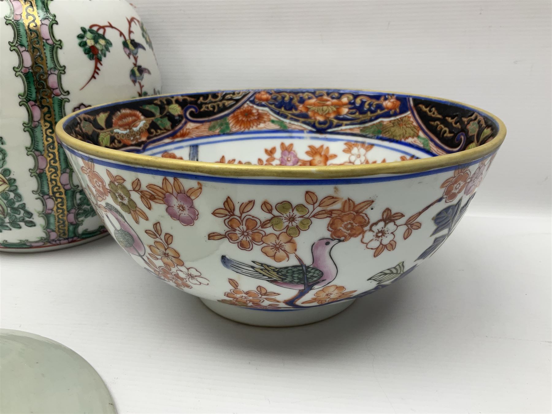 19th century and later Chinese ceramics, to include charger, with hand painted floral and foliate decoration, footed bowl, decorated in enamel with birds amongst prunus blossom,  a smaller plate decorated with figural panels and a ginger jar with cover, with hand painted floral decoration and four character marks beneath, charger D40.5cm