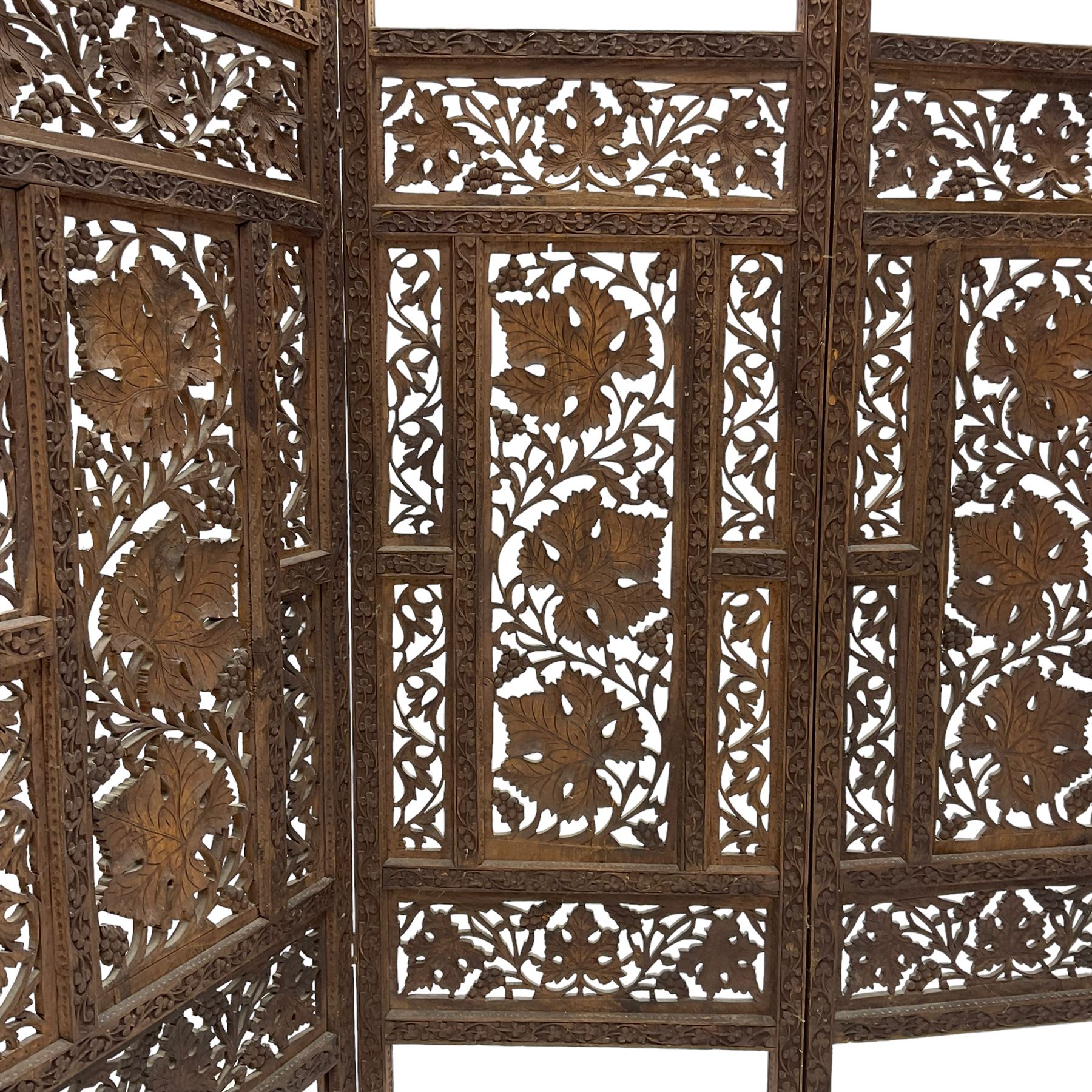 Anglo-Indian heavily carved and pierced three panel folding screen 