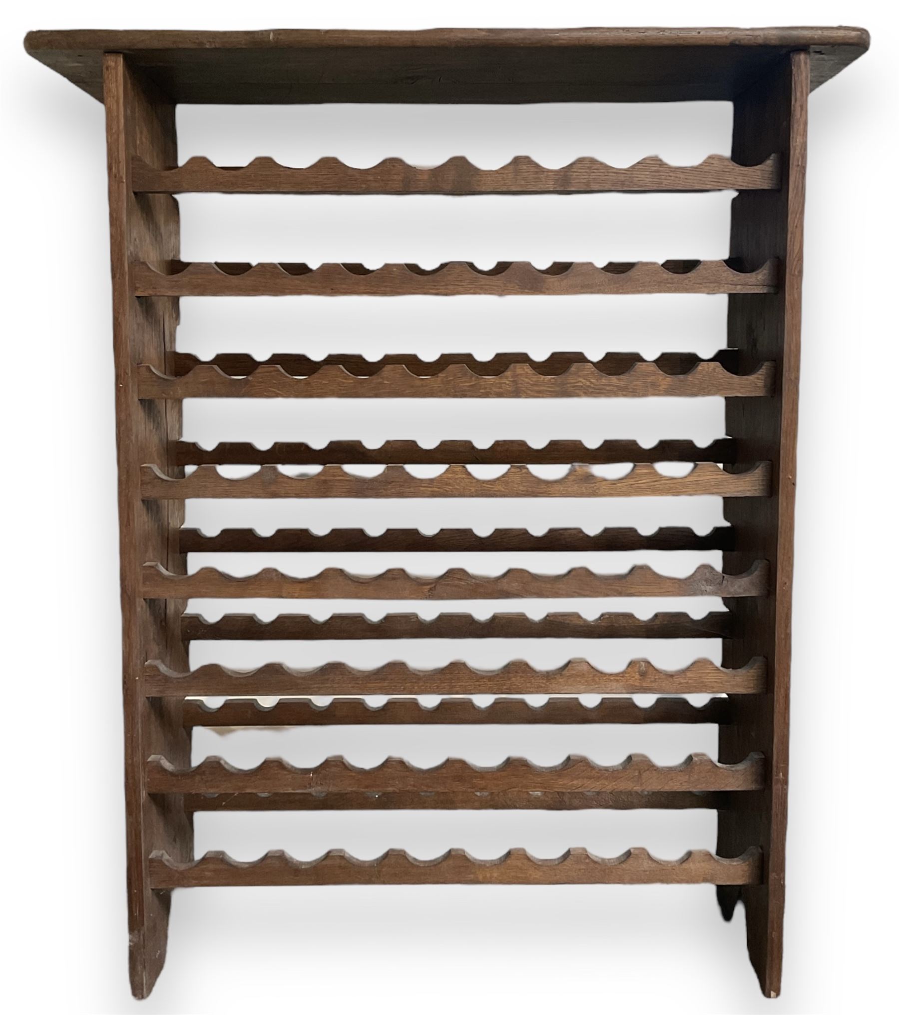 Large reclaimed oak eight tier wine rack, rectangular top over eight racks each with ten bottle divisions, on end supports