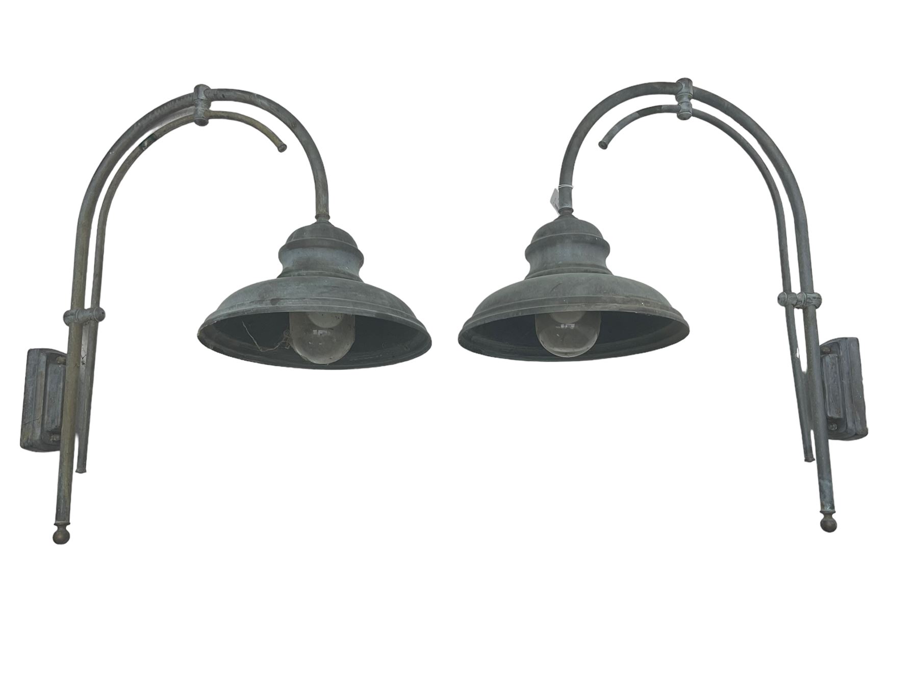 Two grey outdoor metal lamps, arched form with circular shades