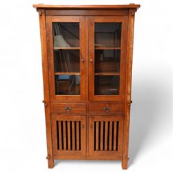 20th century reclaimed hardwood bookcase display cabinet, fitted with two glazed doors above two drawers, two slatted cupboards to base