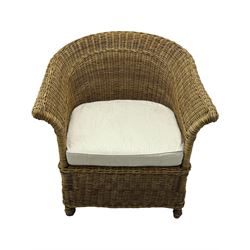 Rattan armchair and ottoman set, pair of armchairs featuring rounded backrests with wide armrests, woven wicker frame with weaving and upholstered seat cushions in off-white fabric with flowing floral pattern (W83 D80 H78cm); matching round ottoman with upholstered cushion on square wooden feet (W65 D65 H37cm)