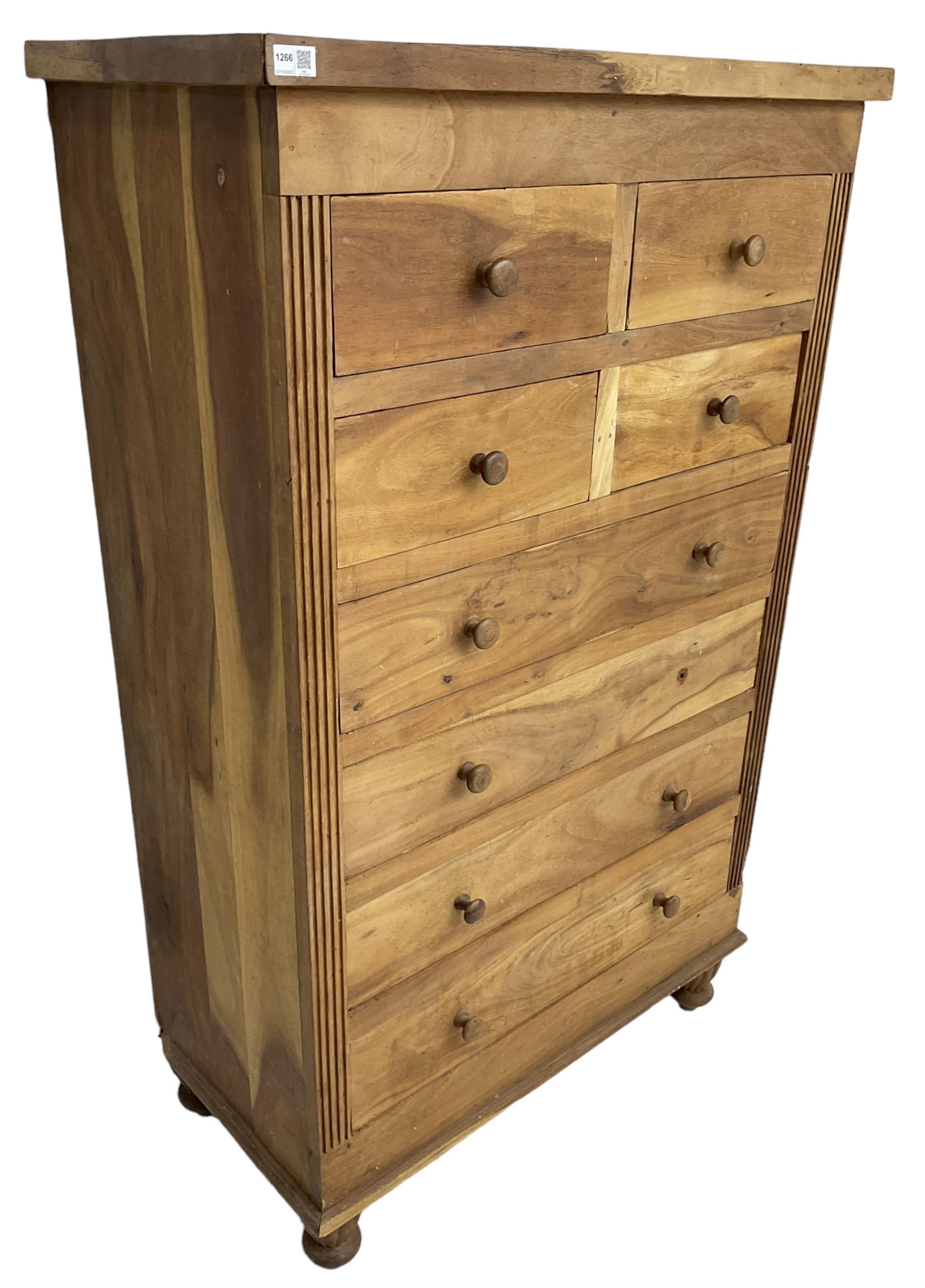 Hardwood chest, fitted with four short and four long drawers