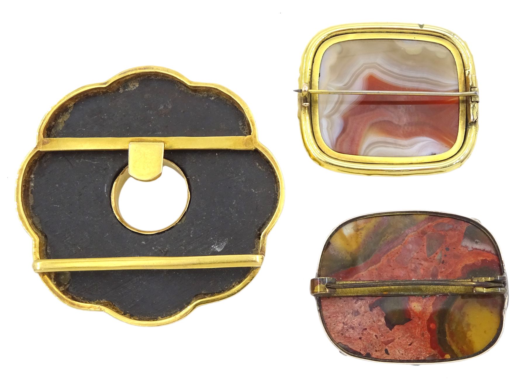 Early 20th century 19ct gold hardstone buckle and two gold-plated agate brooch and one other brooch