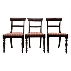 Set of six Victorian mahogany dining chairs, curved bar back over drop-in seat upholstered in striped fabric, on turned front supports