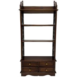 Georgian design mahogany open bookcase, fitted with three open shelves flanked by pierced uprights, with four drawers to the base with scalloped apron