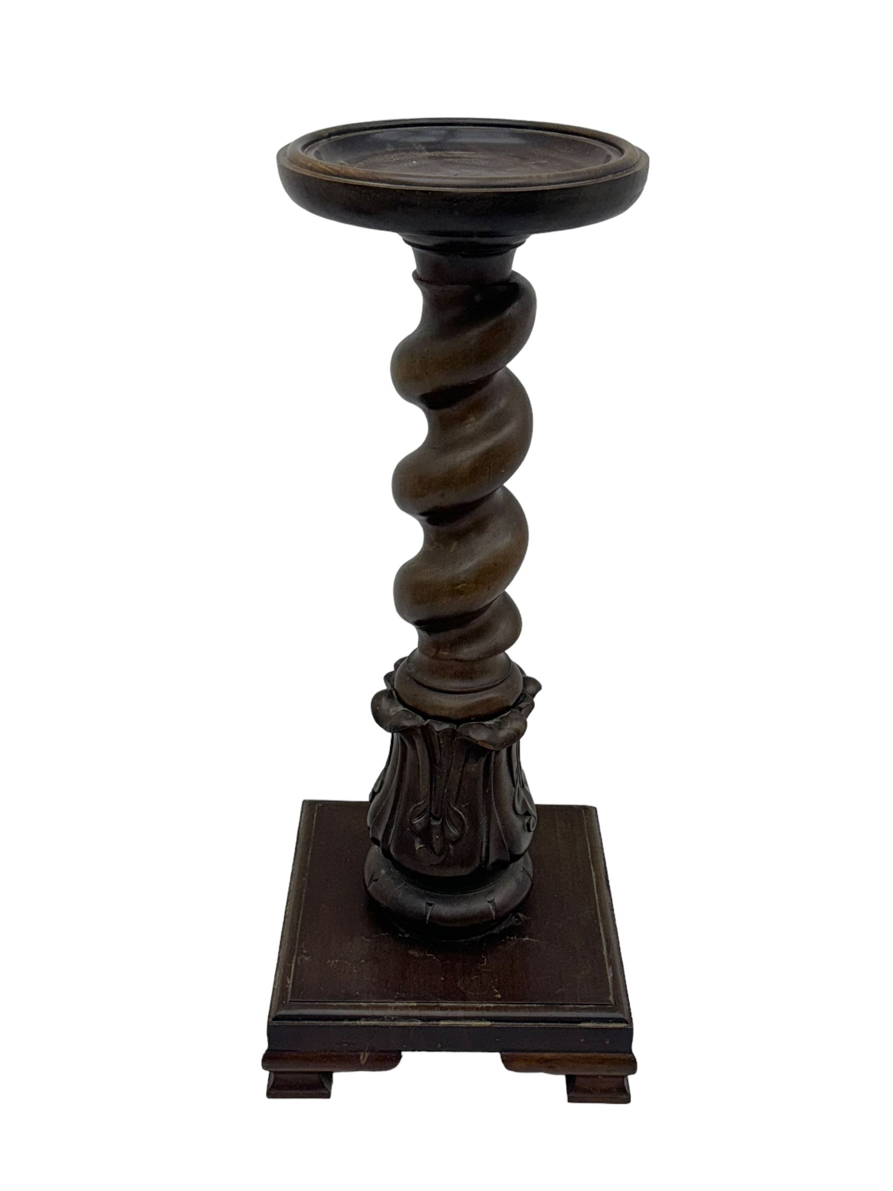 Late 19th century mahogany plant stand or torchère, circular top over barley twist column and carved acanthus base, on square plinth with bracket supports