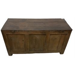 Large 18th century oak coffer or blanket box, hinged lid over triple panelled front, panelled back and sides, on stile supports 