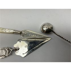 Two small silver page markers in the form of trowels, both hallmarked, together with a small silver and enamel dish, decorated with central panel of flowers, with London import mark, and a small group of flatware, to include Victorian salt spoon, approximate gross weight 111.6 grams
