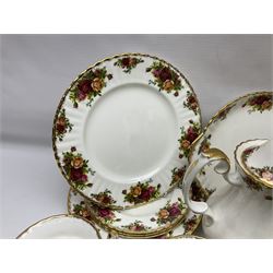 Royal Albert Old Country Roses pattern coffee service for six, comprising coffee pot, milk jug, cups and saucers, cake plate, together with miniature teapot, six teacups and saucers, six dinner plates, six side plates etc 