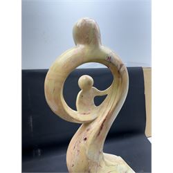 Abstract marble sculpture modelled as a mother and child on a rectangular base, H62cm