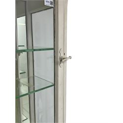 Edwardian white painted display case, single glazed door enclosing five glass shelves, mirror back to interior