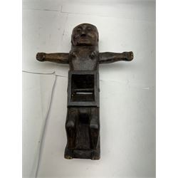 An unusual tribal carved wood figural plane, modelled as a figure with outstretched arms, L31cm