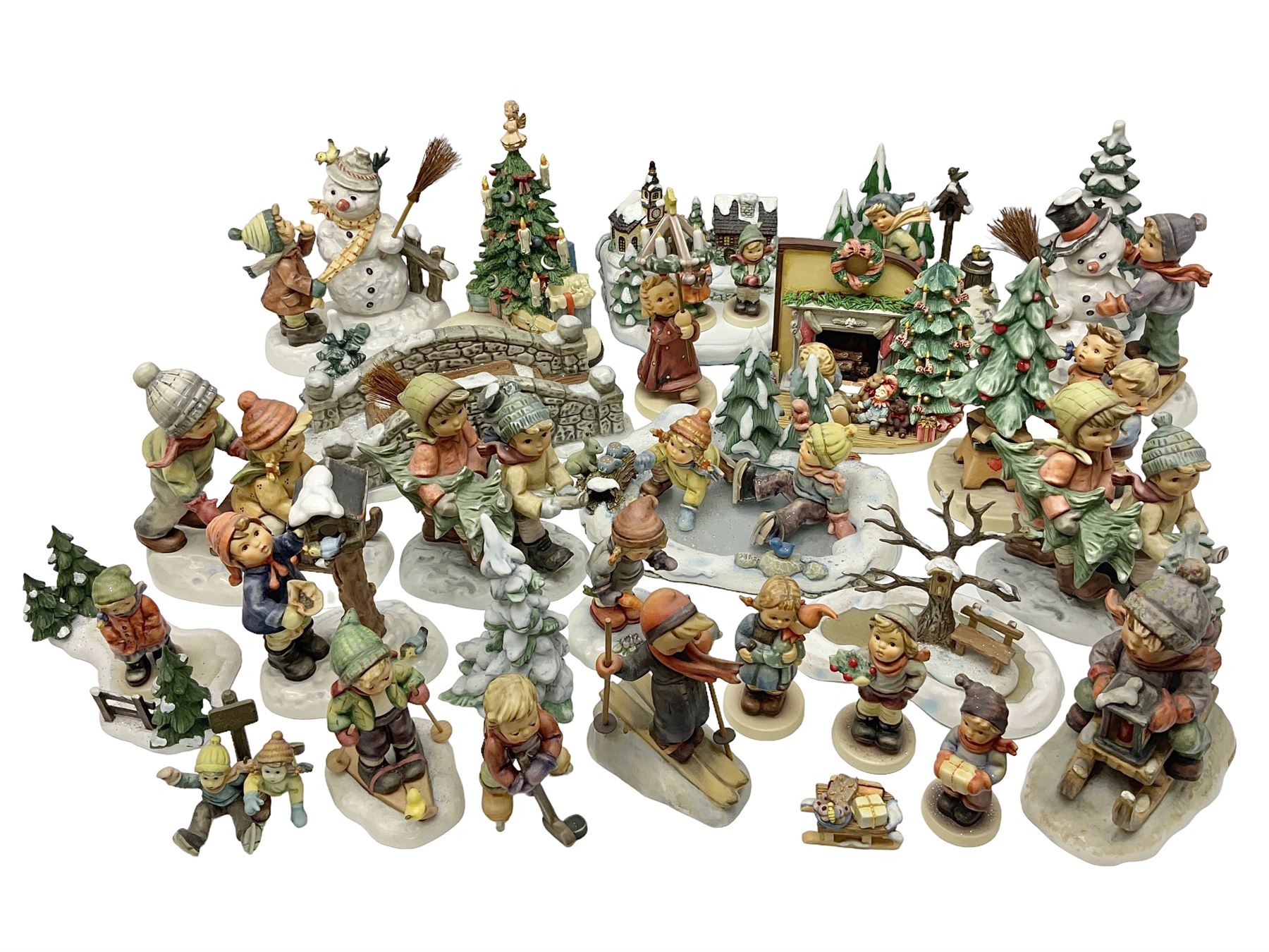 Large collection of Christmas themed Hummel figures and Hummel