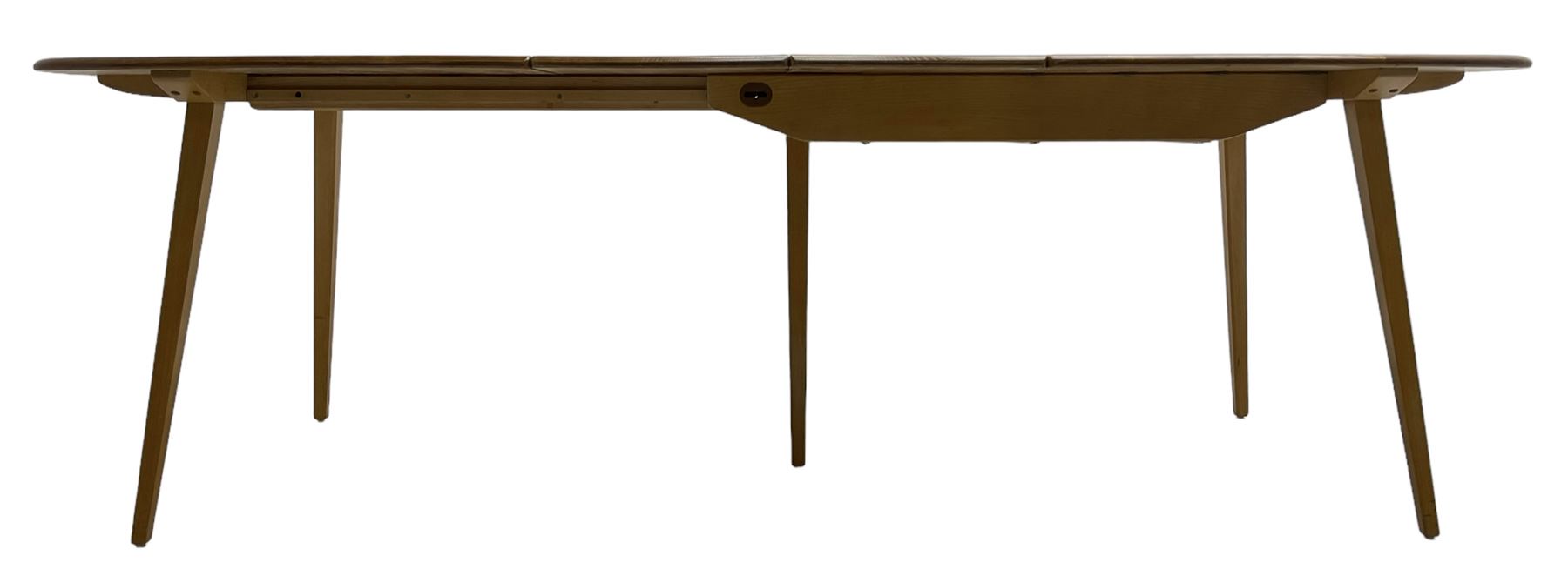 Ercol - light elm and beech 'Slide Leg Expanding Dining Table (444)', rectangular top with rounded corners, raised on tapered splayed supports, with two additional leaves