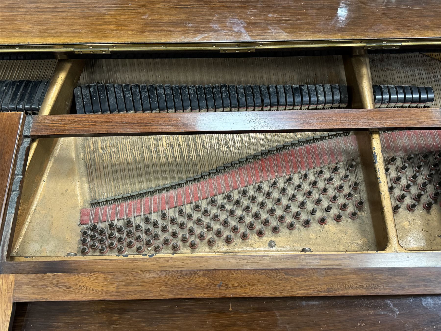 John Broadwood & Sons London - 19th century rosewood grand piano serial  No 47356 (1900-1910) overstrung cast iron frame with 88 notes, 7 octaves, Lyre with sostenuto and una-corda pedals, split-hinged key fall board and fretted music desk, case raised on three taper turned legs with brass castors, original stringing, felt, hammers, dampers and grand roller action.

This item has been registered for sale under Section 10 of the APHA Ivory Act