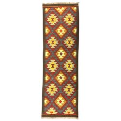 Maimana Kilim ground runner, multicoloured geometric medallions arranged in rows, with tri...