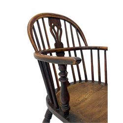 19th century yew wood and elm Windsor armchair, low double hoop stick and pierced splat back, dished seat on turned supports united by crinoline stretchers