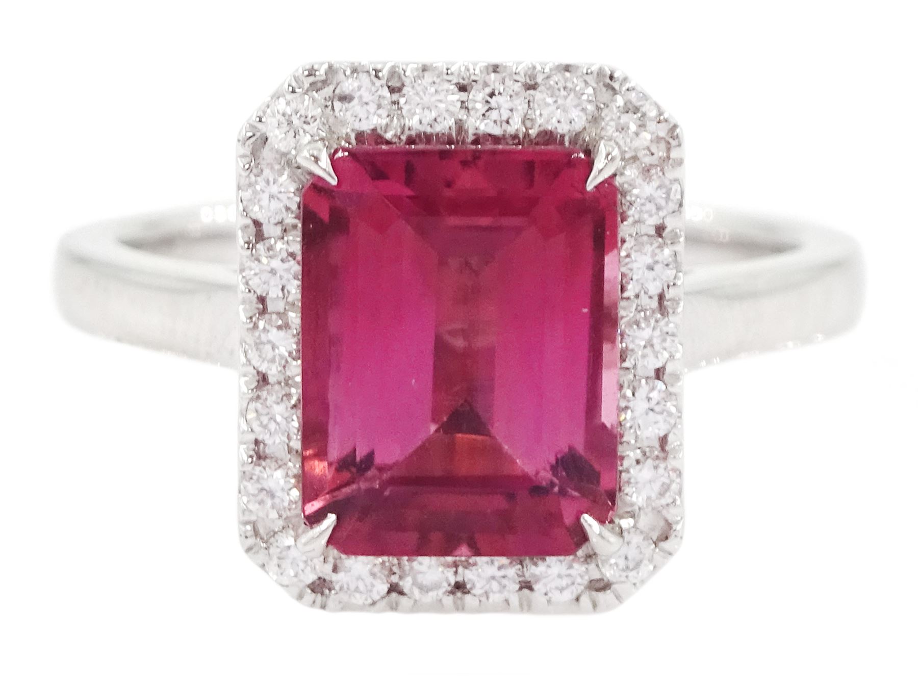 18ct white gold emerald cut tourmaline and round brilliant cut diamond cluster ring, hallmarked, tourmaline approx 2.45, total diamond weight approx 0.20 carat