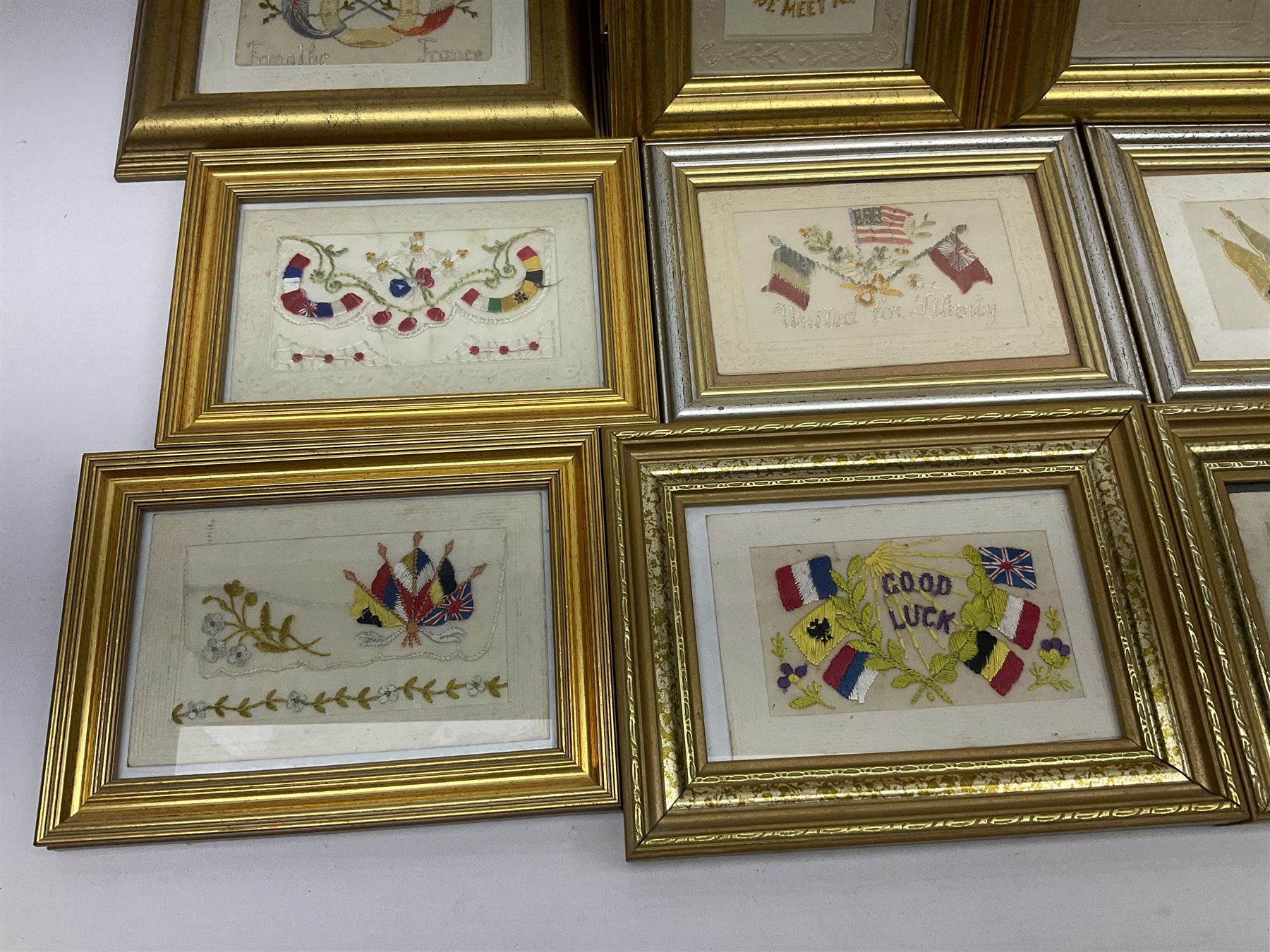 Collection of approximately thirty WWI period embroidered silk greetings cards and post cards,  mostly military examples, including 'Right is Might', 'Remember Me!', 'Greetings from your soldier boy', etc