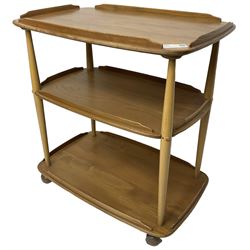 Ercol - mid-20th century light elm 'three tier tea trolley, on castors