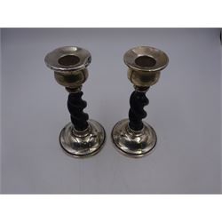 Pair of 1920s silver mounted ebonised barley twist candlesticks, hallmarked Payton, Pepper & Co, Chester 1927, H15cm