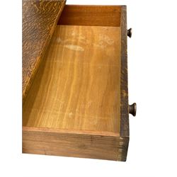 Mid-20th century oak chest, fitted with five drawers, the top drawer carved with flower head roundels, on bracketed plinth base 