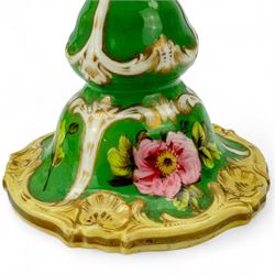 19th century bottle vase and associated cover, the body hand painted with a view of Inveraray Castle, against a green ground, H24cm, pair of green ground spill vases, with floral encrusted banding, H10cm, together with a pair of green ground candlesticks, probably Coalport (5)