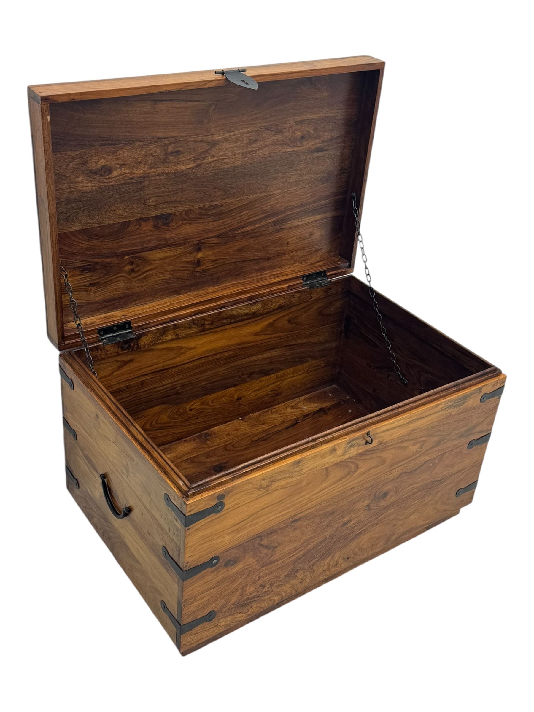 Hardwood and metal bound chest, enclosed by hinged lid, fitted with metal carrying handles