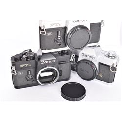 Three Canon FTb SLR camera bodies, to include a black example, serial no. 869426, and two black and silver examples, serial no. 712549 and 192507