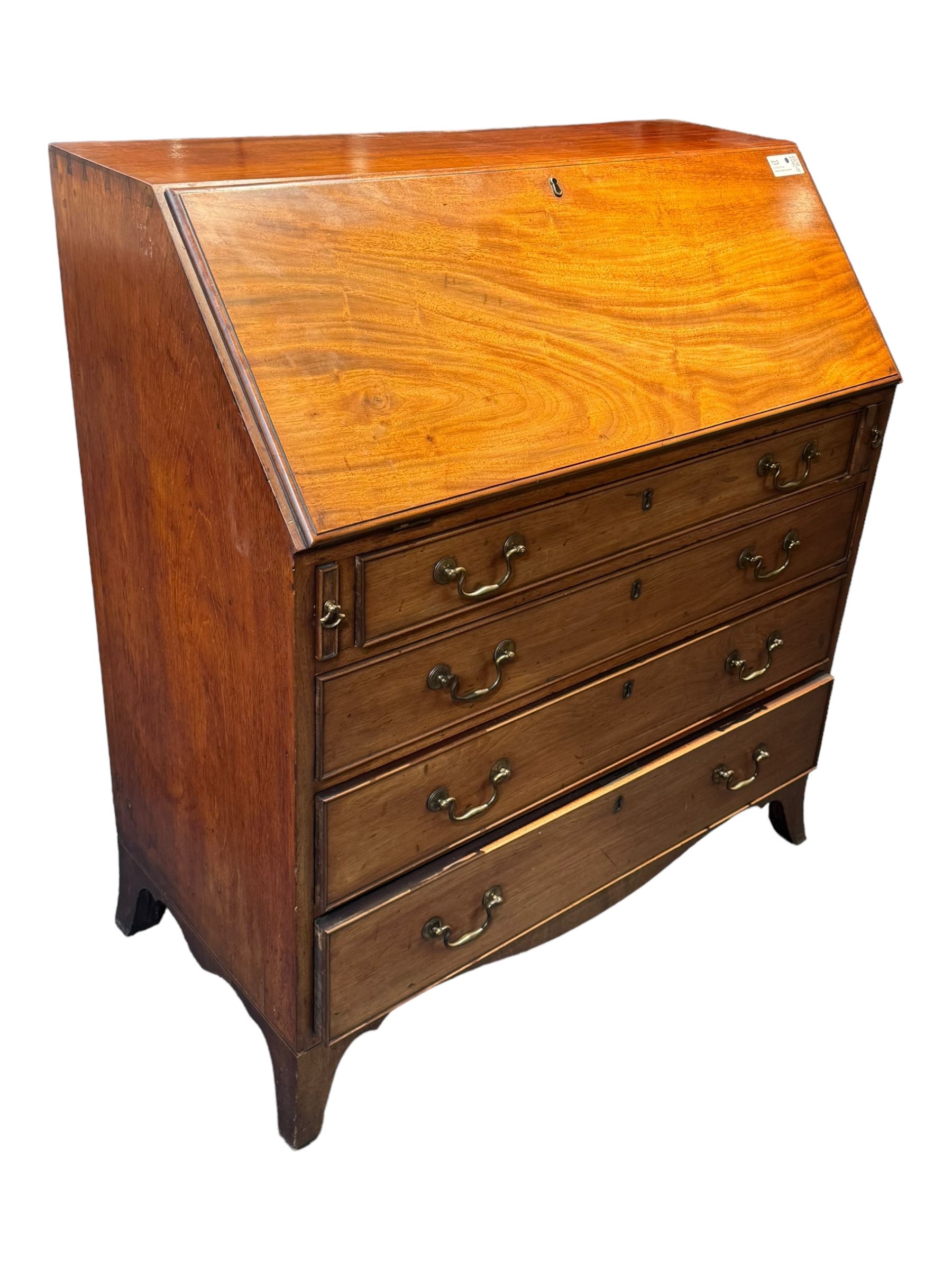 Georgian mahogany bureau, moulded fall front enclosing cupboard, small drawers, pigeonholes and inset writing surface, fitted with four long graduating cock-beaded drawers, on splayed bracket feet 