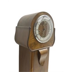 English - 1950's walnut 8-day quarter chiming grandmother clock, rounded top with a splayed base on bracket feet, wooden dial centre with a silvered chapter dial, chrome hands and roman numerals enclosed within a chrome bezel, three train going barrel movement chiming the quarters and hours on 8 gong rods. With pendulum.