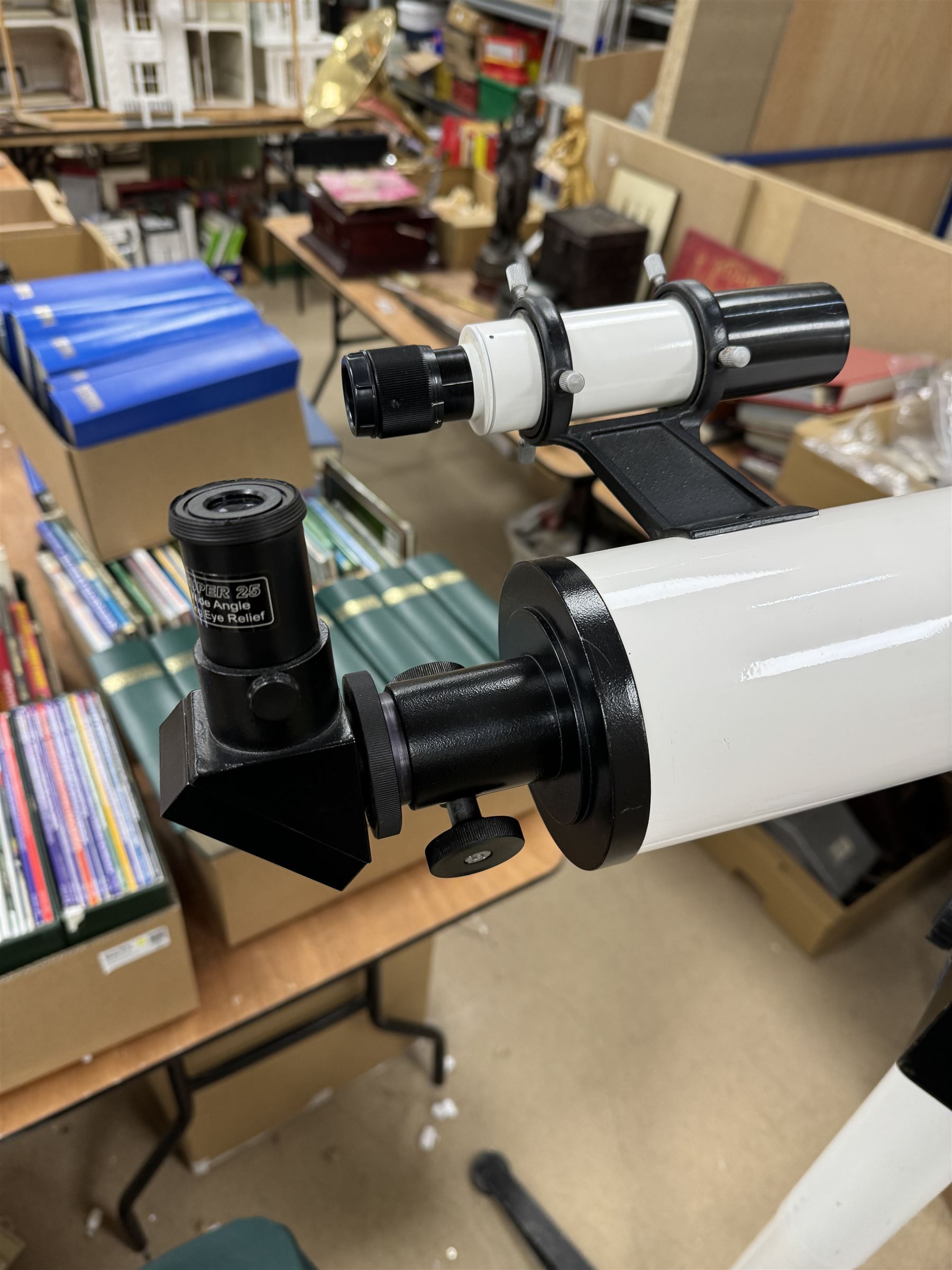 Tal-100R refractor telescope, the objective lens with dark purple coating and cylinder mounted with 6mm x 30mm finder scope, upon a pillar mount with right ascension clock drive, height when mounted H168cm, aperture 10cm, focal length 100cm 