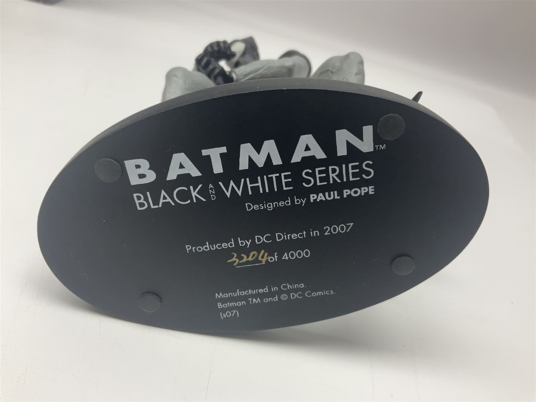 Group of five limited edition DC Direct Black and White Batman hand-painted cold-cast porcelain statues in original boxes, with two similar examples from DC Collectibles 