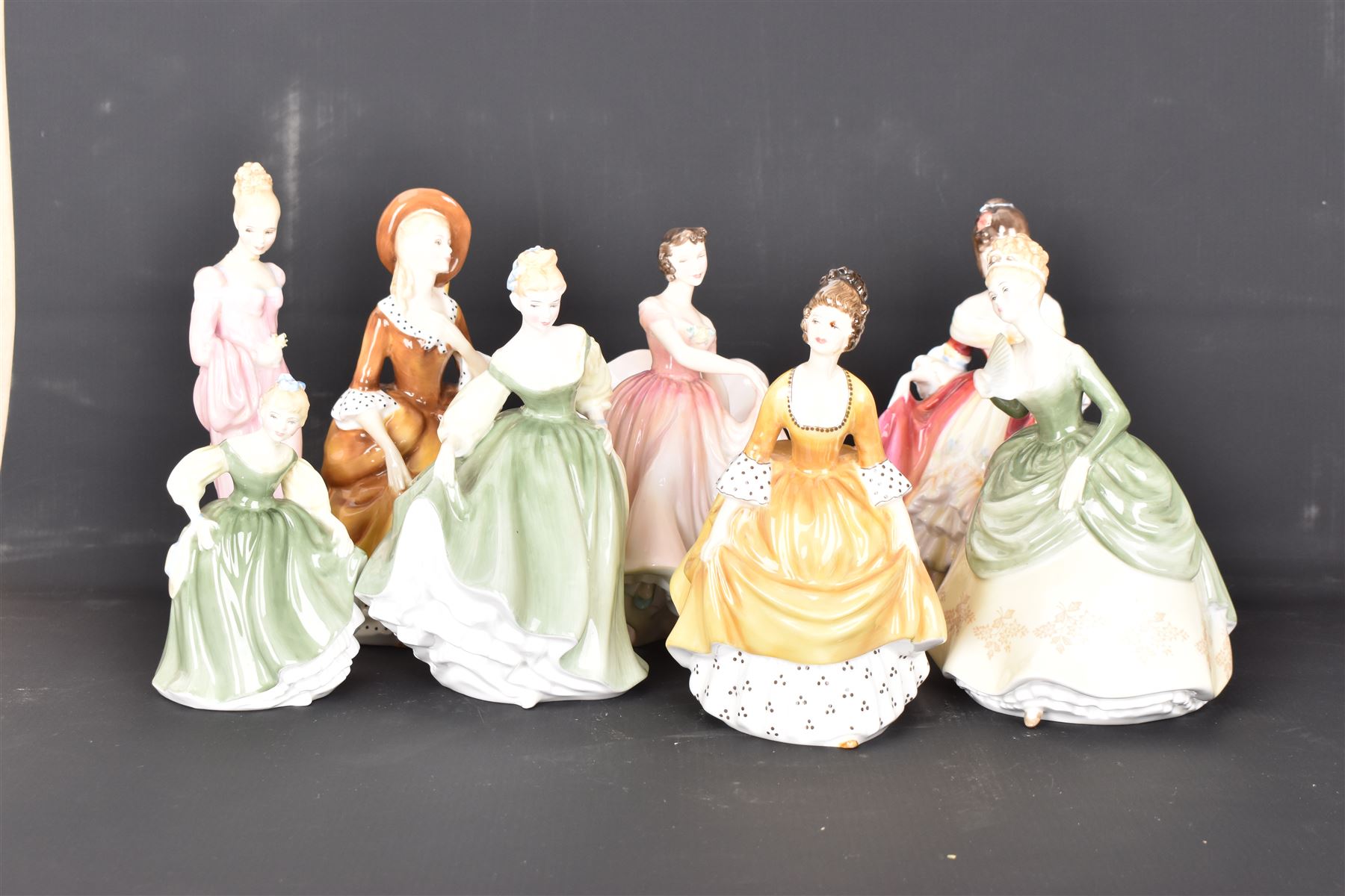 Eight Royal Doulton figures, including Southern Belle, Soiree, Sandra etc 