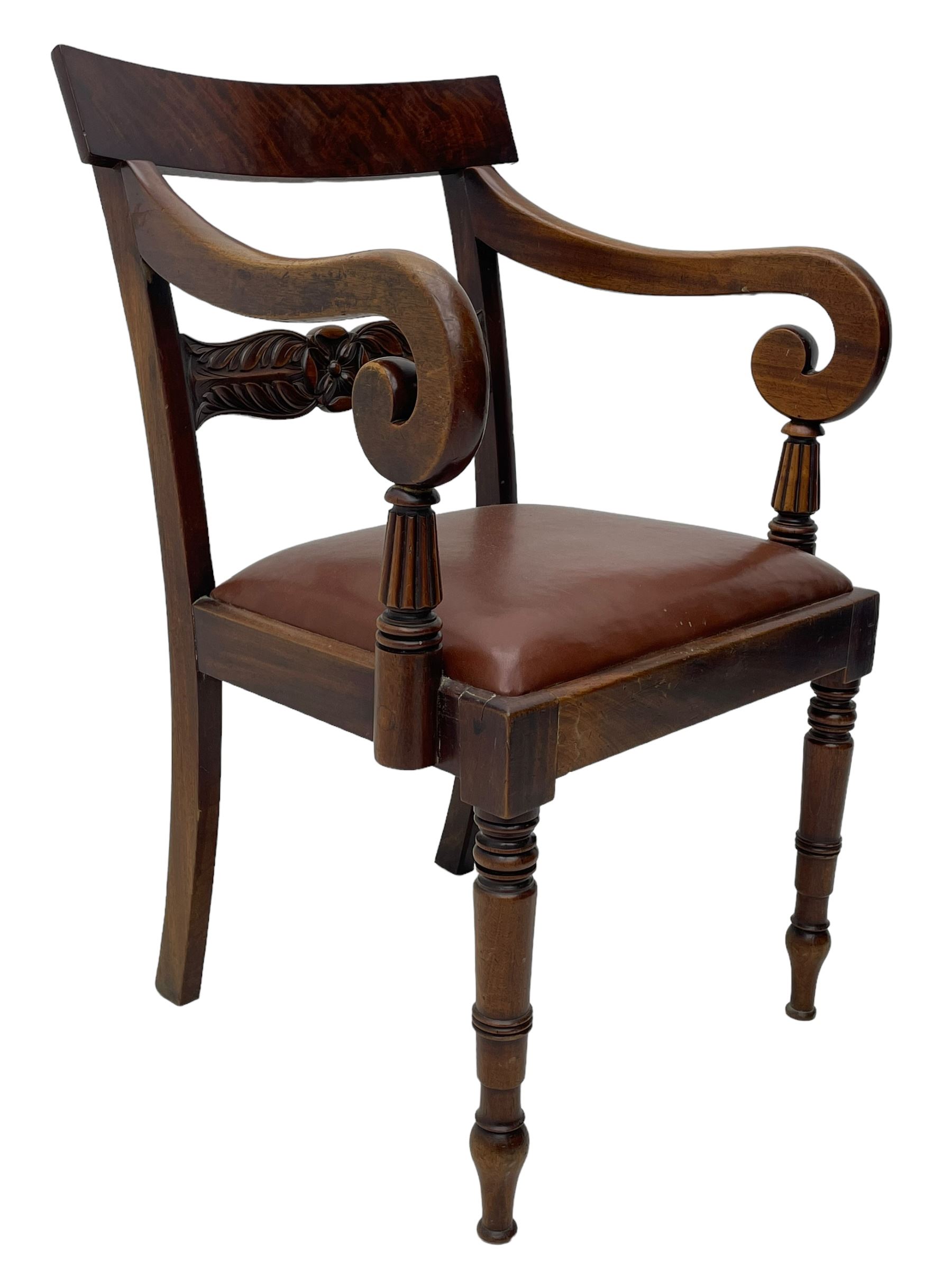 Set of six (4+2) early 19th century mahogany dining chairs, figured bar back over rose and curled leaf carved middle rail, drop-in seats upholstered in brown fabric, on turned front supports 