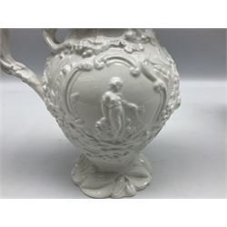 Pair of rare early/mid 19th century Copeland and Garrett white glazed pitchers, modelled in the Georgian style and moulded with the figures of Venus the Roman Goddess of Love, and Aurora the Roman Goddess of Dawn, within C scroll borders and foliate surround, the naturalistically modelled handle leading to a fruiting vine beneath the rim, upon a spreading base moulded with seashells, with printed green crowned wreath mark beneath, H20cm