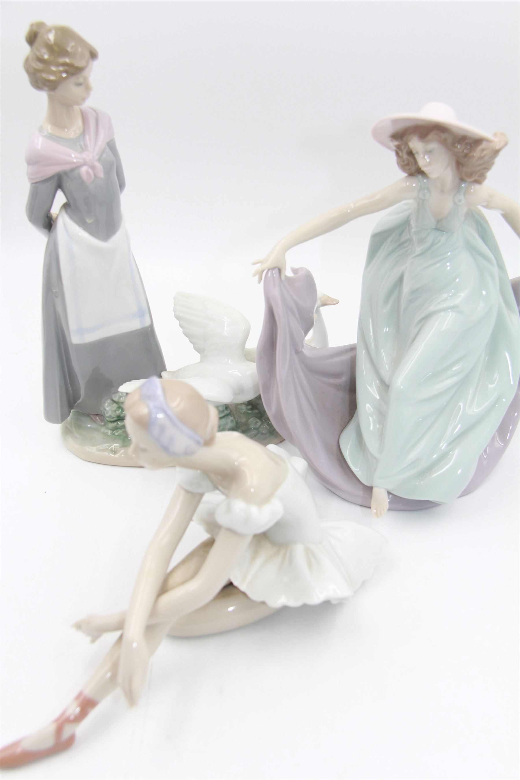 Three Lladro figures, comprising May Dance no 5662, Barnyard Scene no 5659 and Rose Ballet no 5919