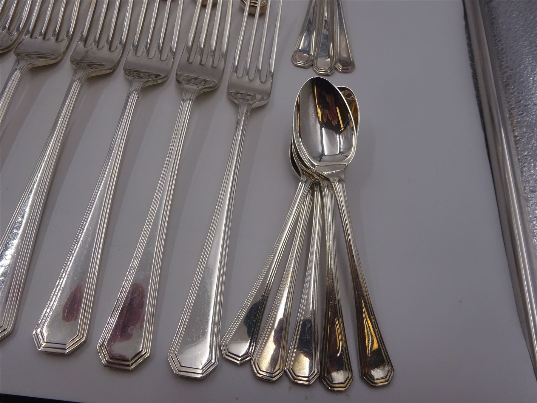 Mappin & Webb Athenian pattern silver cutlery for eight place settings, comprising table forks, silver handled table knives, dessert spoons, dessert forks, silver handled butter knives, soup spoons and teaspoons, hallmarked Mappin & Webb Ltd, Sheffield 1978, contained within anti-tarnish fabric wraps and boxed 