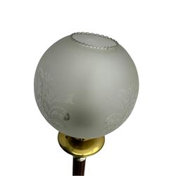 Victorian brass and wood standard lamp, frosted glass globe shade with etched floral design, brass collar above reeded wooden column with metal spacers, on circular brass base with fluted decoration